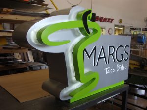 Custom signs and wraps